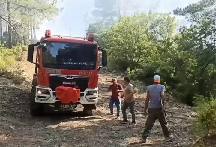 Marmaris’in Yeşilbelde Mahallesinde orman yangını: Kontrol altına alındı