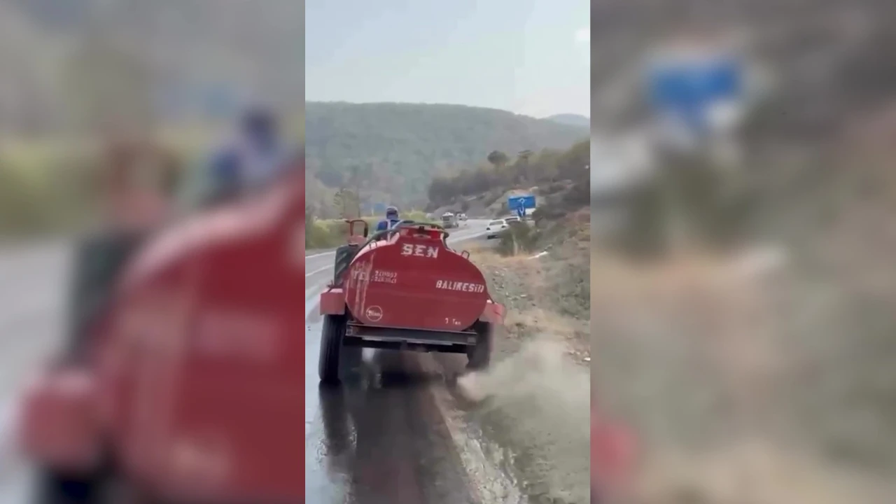 Bursa'da yürekleri ısıtan görüntü! Bir çiftçi, patlayan lastiğe rağmen yangına su taşıdı