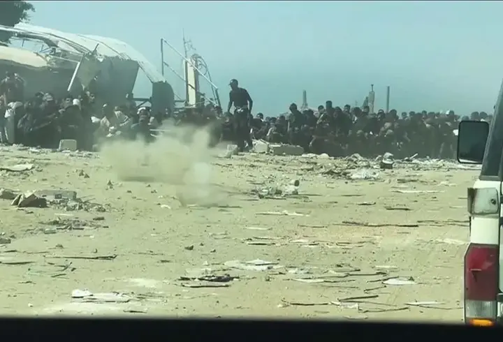 BM ekibi Gazze'de yardım bekleyenlere açılan ateşi kaydetti