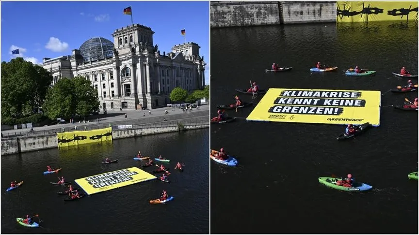 Greenpeace ve Uluslararası Af Örgütü aktivistleri Berlin'de farkındalık eylemi düzenledi