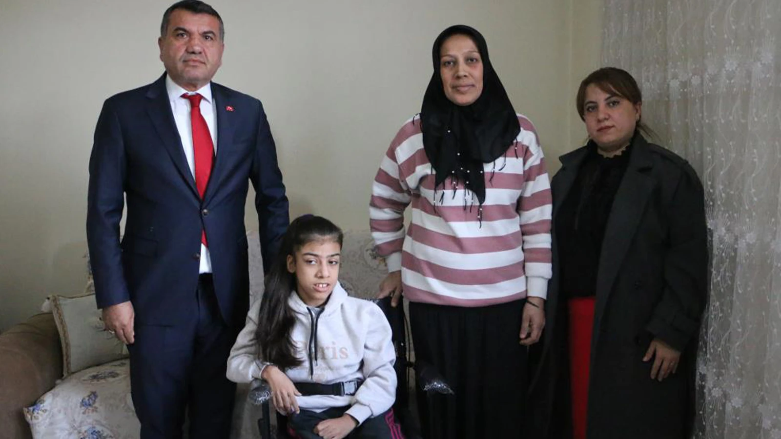 Bahçeli'den Diyarbakırlı engelli kıza tekerlekli sandalye sürprizi