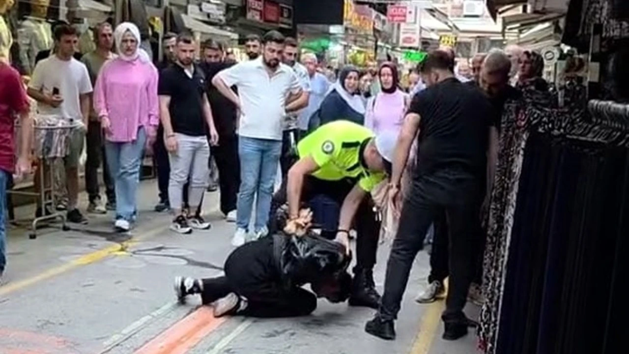 Yaz ortasında giydiği mont şüphe uyandırdı, üzerinden tabanca çıktı